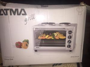 Vendo horno grill permuto por celular