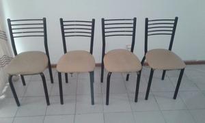 Vendo mesa redonda con cuatro sillas