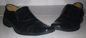 zapatos negros cien por ciento cuero