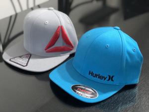 gorras importadas Reebok y Hurley