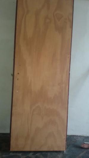 Vendo puerta placa de pino de 1.90 m x 0.70 m. sin uso