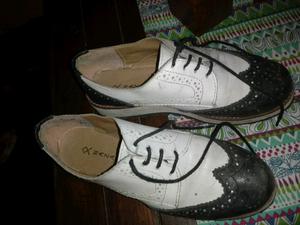 Zapatos blanco y negro