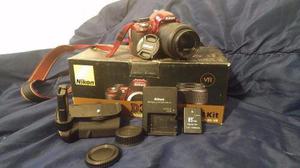 Camara Nikon D3100 Roja (38110 Disparos), Lente 18.55 Grip