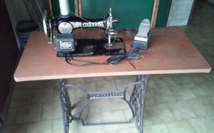 Máquina de coser antigua Singer eléctrica