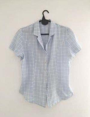 100 camisa, talle medio, no se rebaja ni permuta. Celular