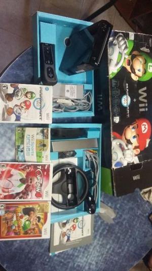 Nintendo Wii + control remoto+ volante + 4 juegos