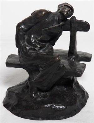 "Un homme assis sur un banc", escultura en bronce