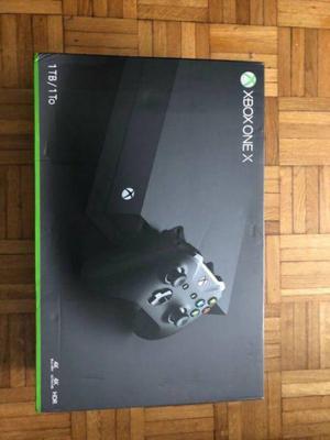 vendo xbox one x nueva mas 2 controles y dos juegos