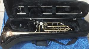 Trombon Bajo con doble trampositor sin uso. Se vende ugente!