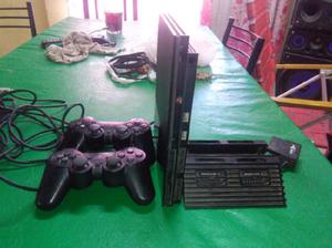 PlayStation 2.vendo con 2 joystick y accesorio para 4