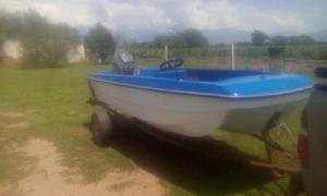 Vendo lancha con motor Yamaha 40HP.