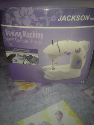 Maquina de coser.