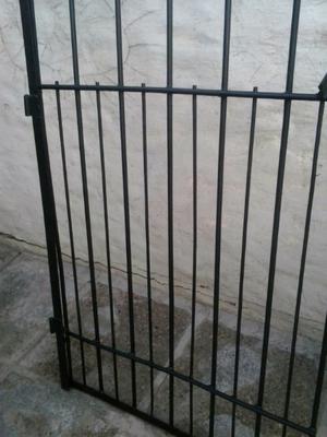 Puerta Reja de Hierro.