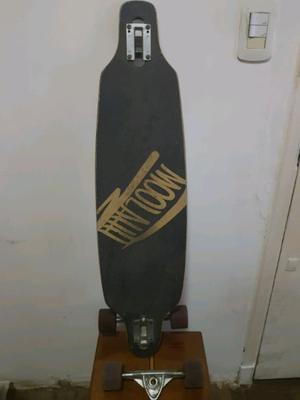 Tabla longboard Moolahh con track a reparar