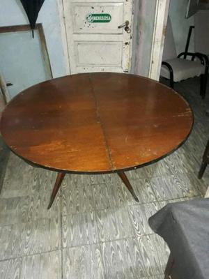 Vendo mesa redonda extensible antigua..