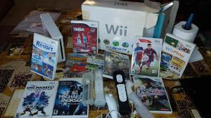Consola Wii en excelente estado y 10 juegos comandos varios.