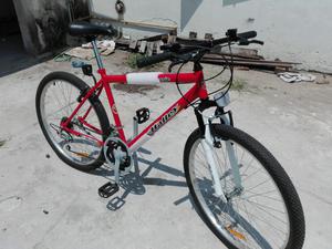 Bicicleta halley con suspensión delantera y cambios, rodado