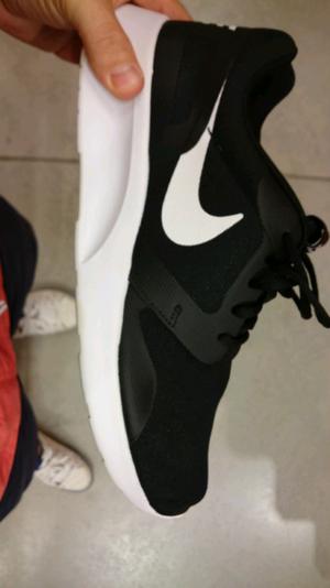 Zapatillas Nike running negras o gris