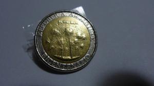 Moneda de un peso del bicentenario con fallas grandes en