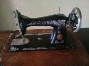 Maquina de coser Singer a reparar