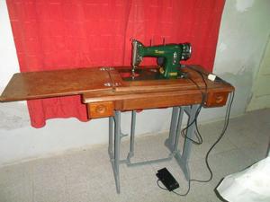 maquina de coser Kopp antigua pero adaptada para enchufar