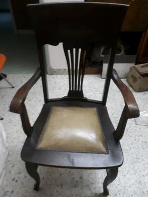 Antiguo sillón tipo Thompson de roble