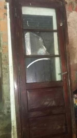 puerta de cdro con marco de algarrobo