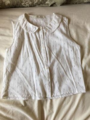 Camisa blanca sin mangas