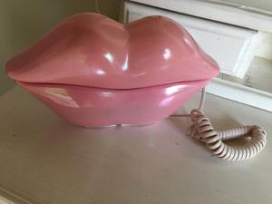 Teléfono beso rosa