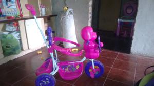 Triciclo paseador de nena