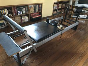 Cama de pilates reformer en hierro