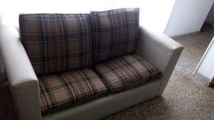 Sillon con cuatro almohadones