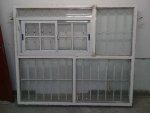 ventana fija 190 x 160 con ventana aluminio corrediza y reja