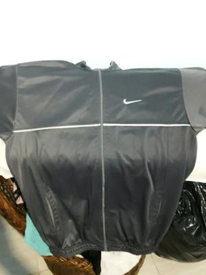 Vendo campera Nike de acetato gris