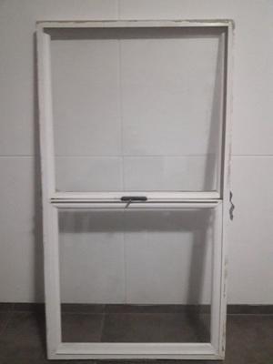 Ventana guillotina de PVC