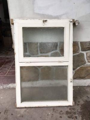 Ventana de cocina con reja