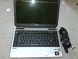 notebook toshiba con cargador