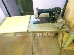 Maquina de coser Nechi eléctrica