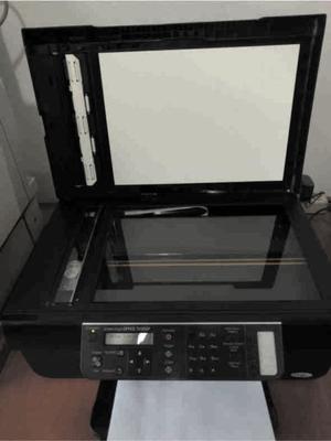 Impresora Epson TX300F con sistema continuo instalado.