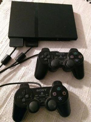 PlayStation 2 + 2 joystick + varios juegos