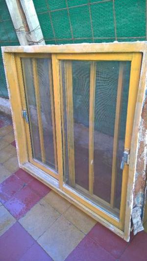 VENDO VENTANA CON REJAS VIDRIOS Y TELA MOSQUITERA