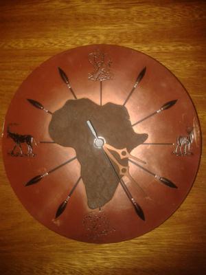Reloj de cobre Africa excelente