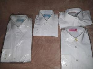 Camisas blancas sin uso
