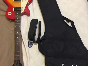 Guitarra Epiphone lp 100 para zurdos (mantenimiento)