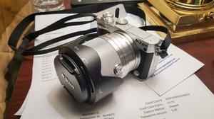Nikon 1 J5 usada con lente m, nikkorvr y