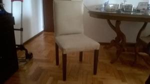 4 sillas revestidas en cuero blanco