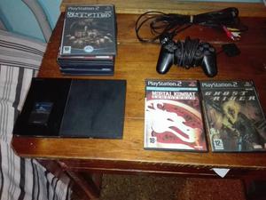 PS2 con 9 juegos, 1 joystick y una memoria de 8 MB. Poco uso