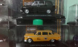 2 taxis de coleccion con sus respectivas revistas