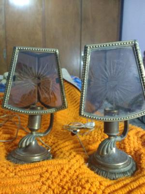 Veladores de bronce y vidrio