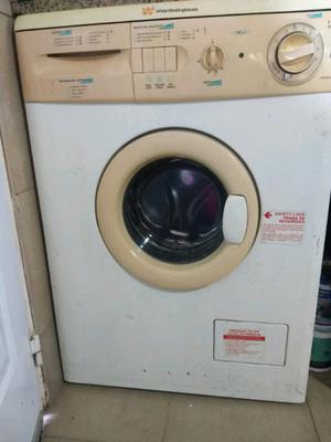 Vendo lavarropas automático white westing house usado